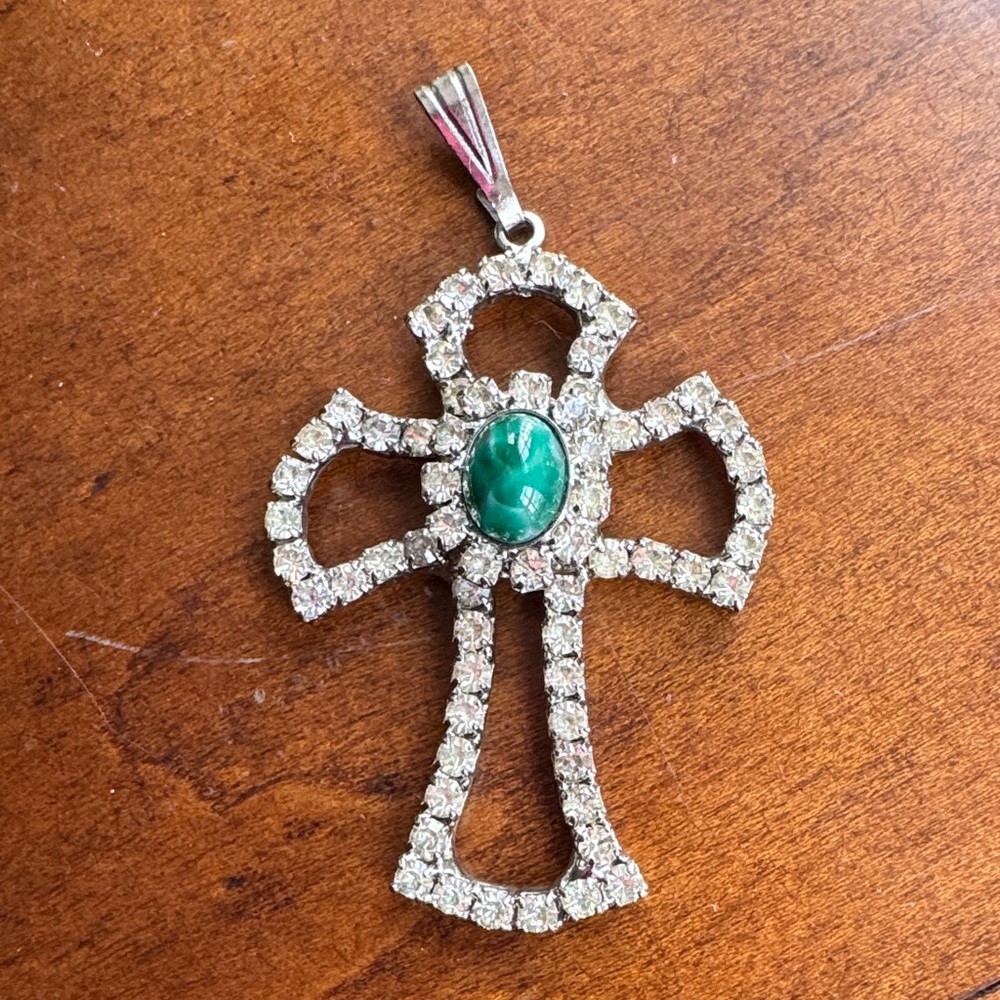 Vintage Czech  cross pendant with green center cabochon and clear rhinestones.